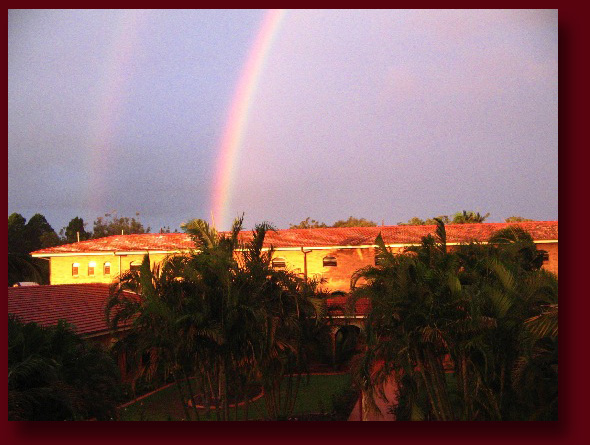 rainbow over monastery